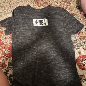 NBA gray shirt sleeve shirt with NBA logo in middle